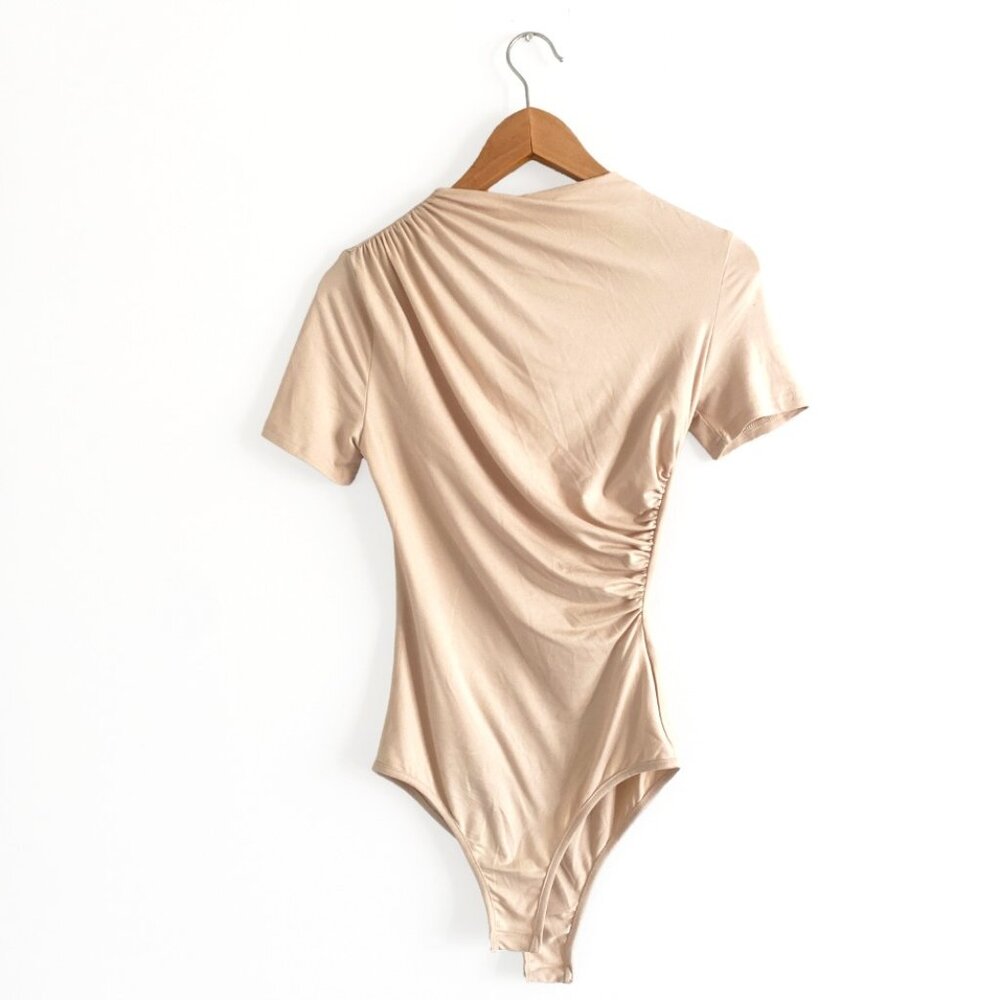 High-neck light beige ruched slimming body suit with snap clasp
